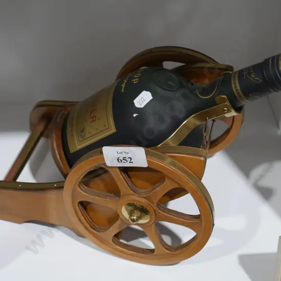 Courvoisier cognac bottle and canon display (full)