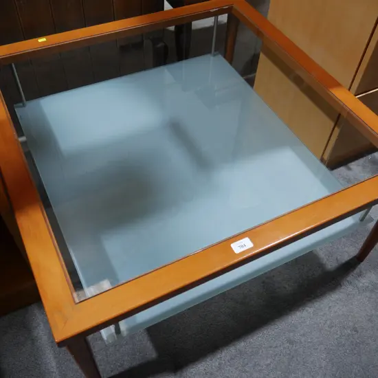 Glass top coffee table