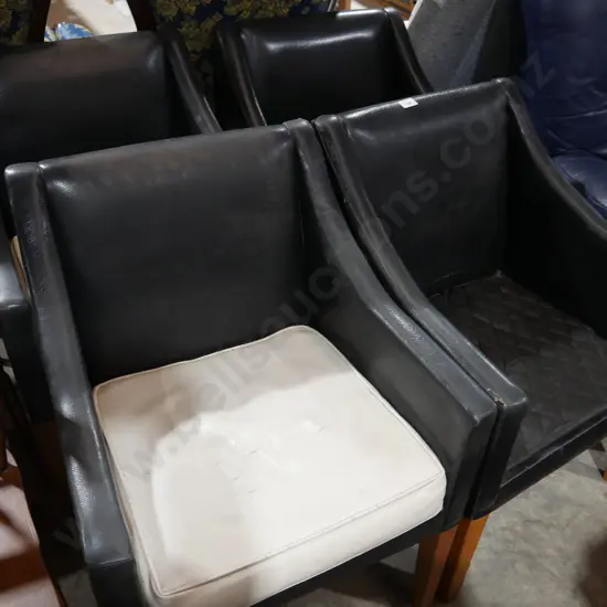 4 black vinyl chairs