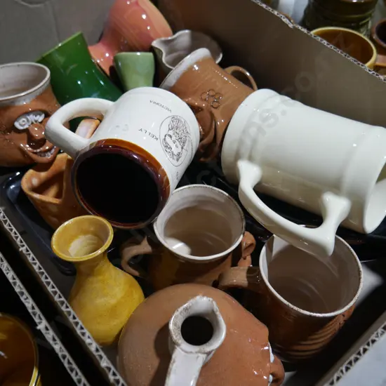 Pottery mugs , jugs