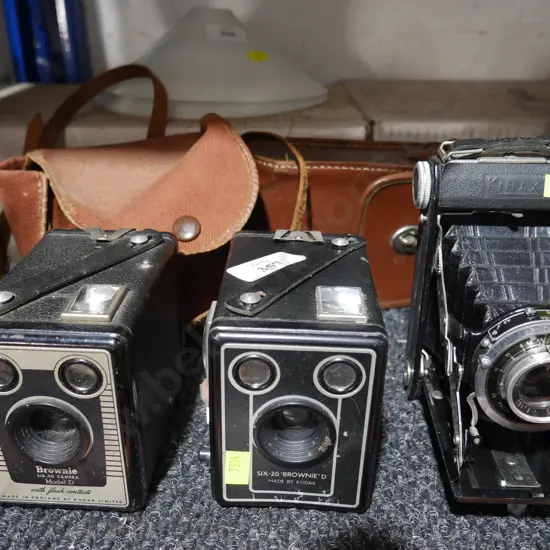 3 old cameras