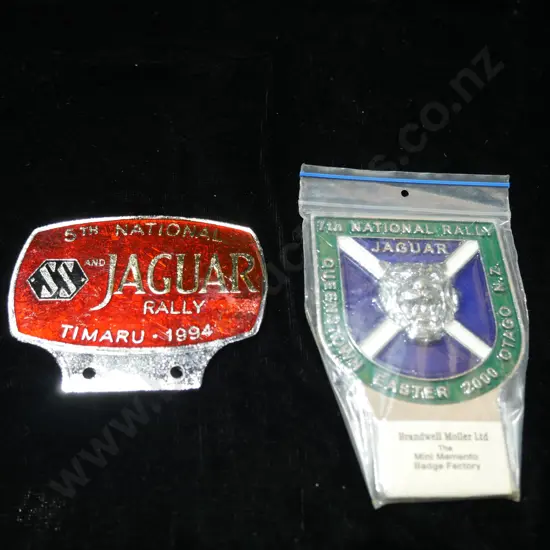 2 Jaguar car badges