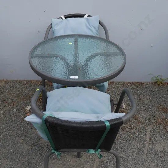 Glass top outdoor table and two chairs