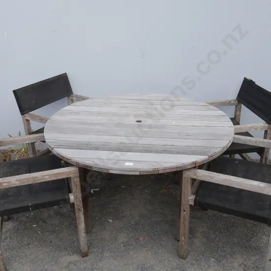 Round outdoor wooden table and four chairs