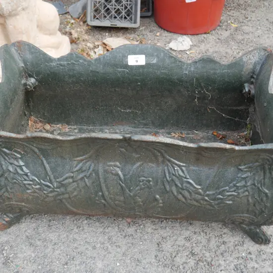 Large green cast iron planter