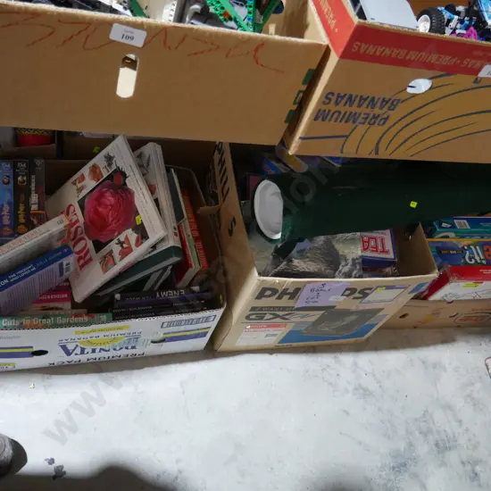 Three boxes of jigsaw puzzles, games, books