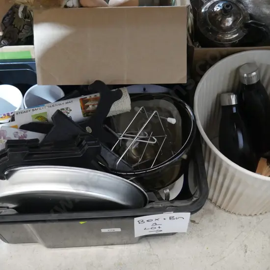 Kitchenware and rubbish bin