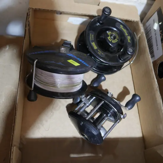 Three fishing reels