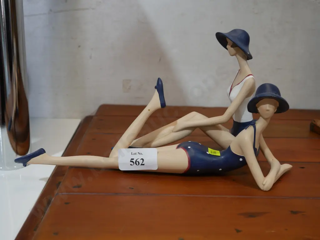 2 lady figurines Image 1++