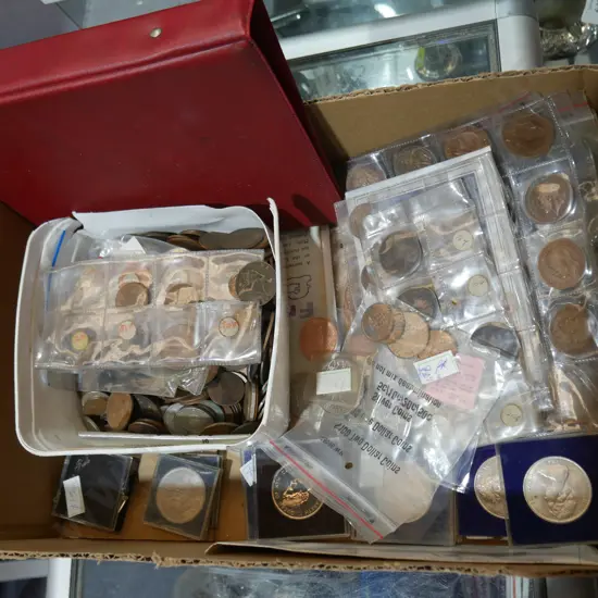 Assorted coins, coin album