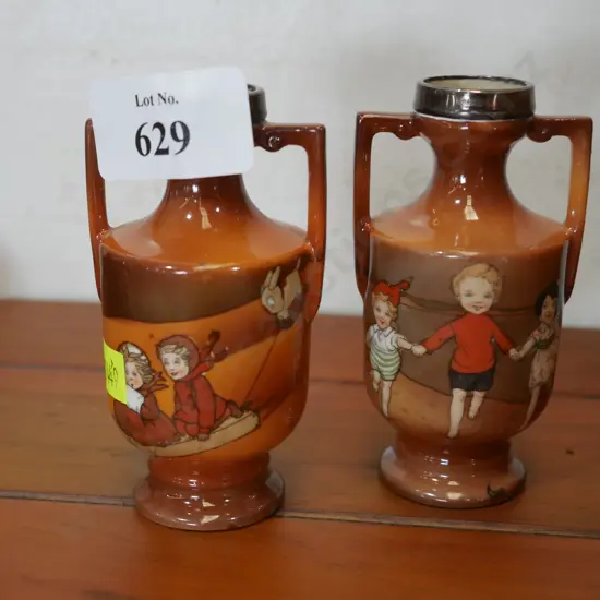 Pair of Royal Bayreuth Sterling silver topped vases