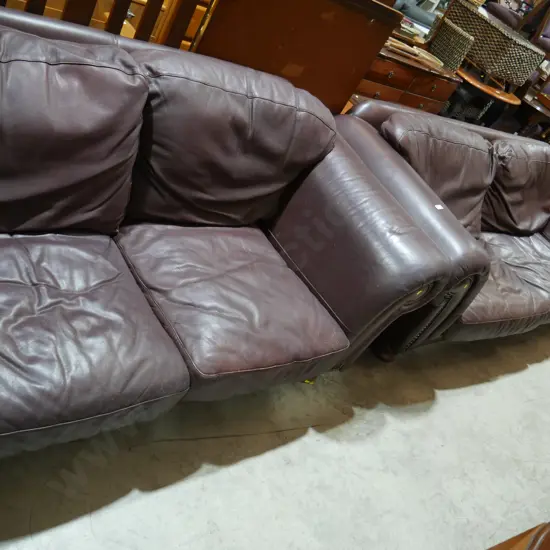Two-piece leather lounge suite