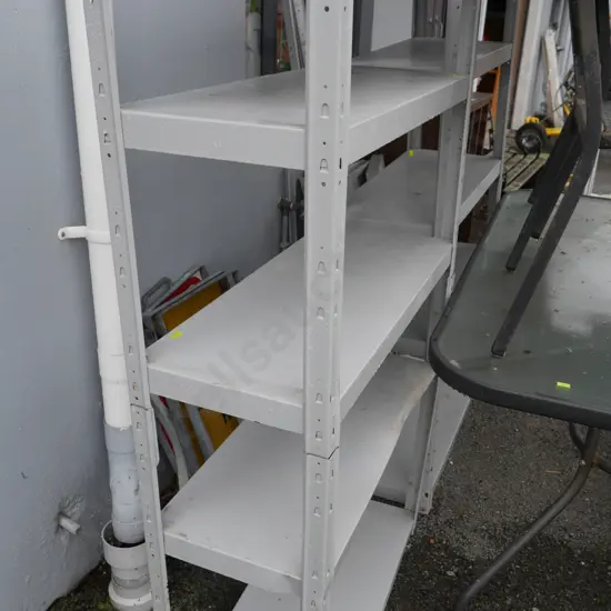 3 metal shelving units