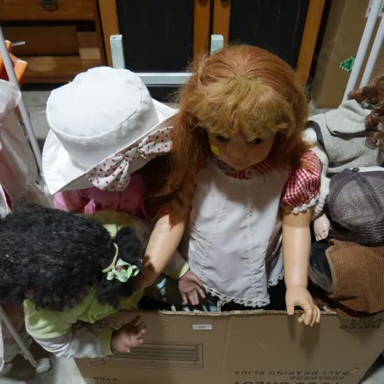 Box of dolls