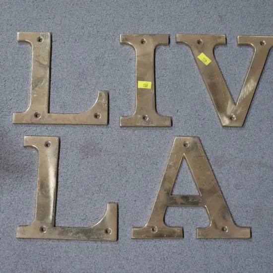 Brass letters
