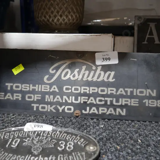 Toshiba plaque