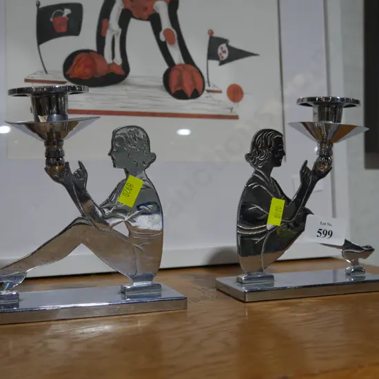 Pair chrome metal lady candlesticks