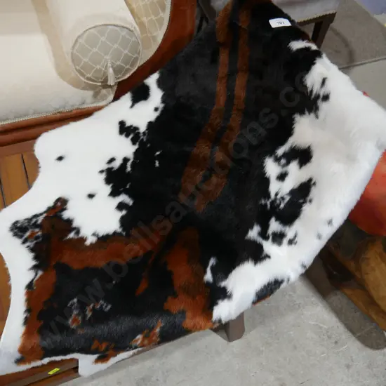 Faux animal hide rug