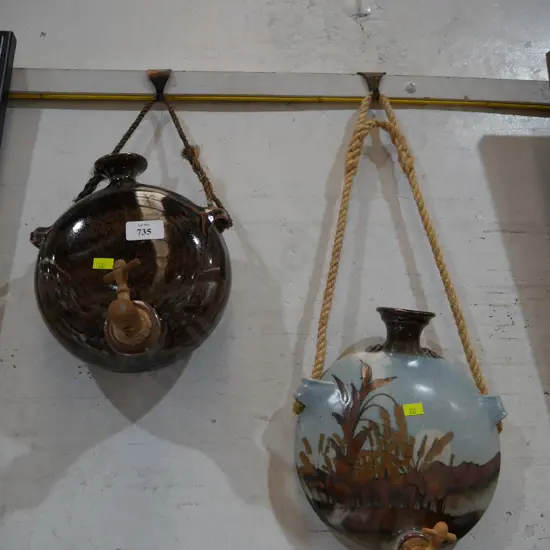 2 pottery water jugs