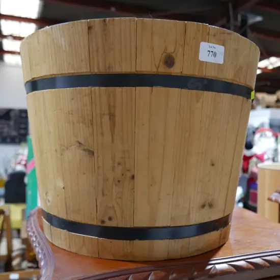 Wooden barrel garden planter