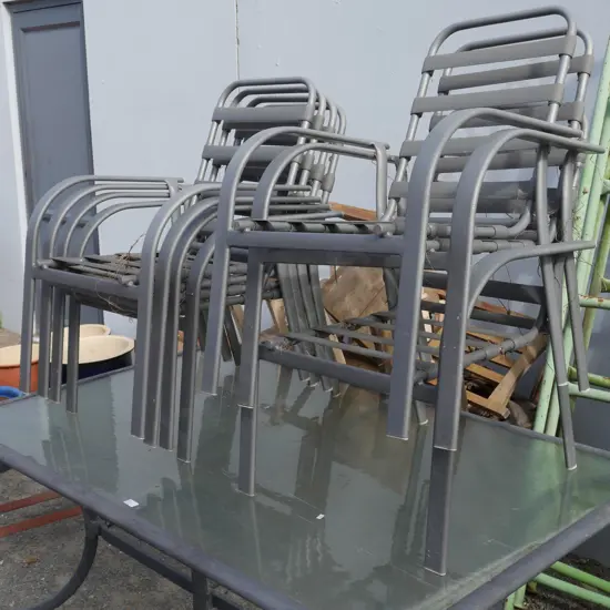 Glass top outdoor table and 6 chairs