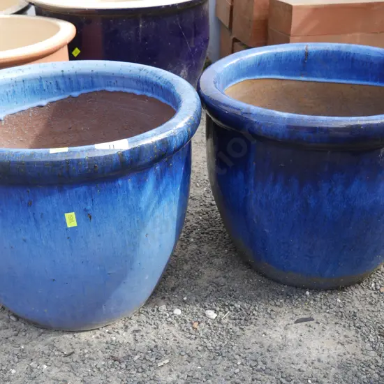 2 blue plant pots