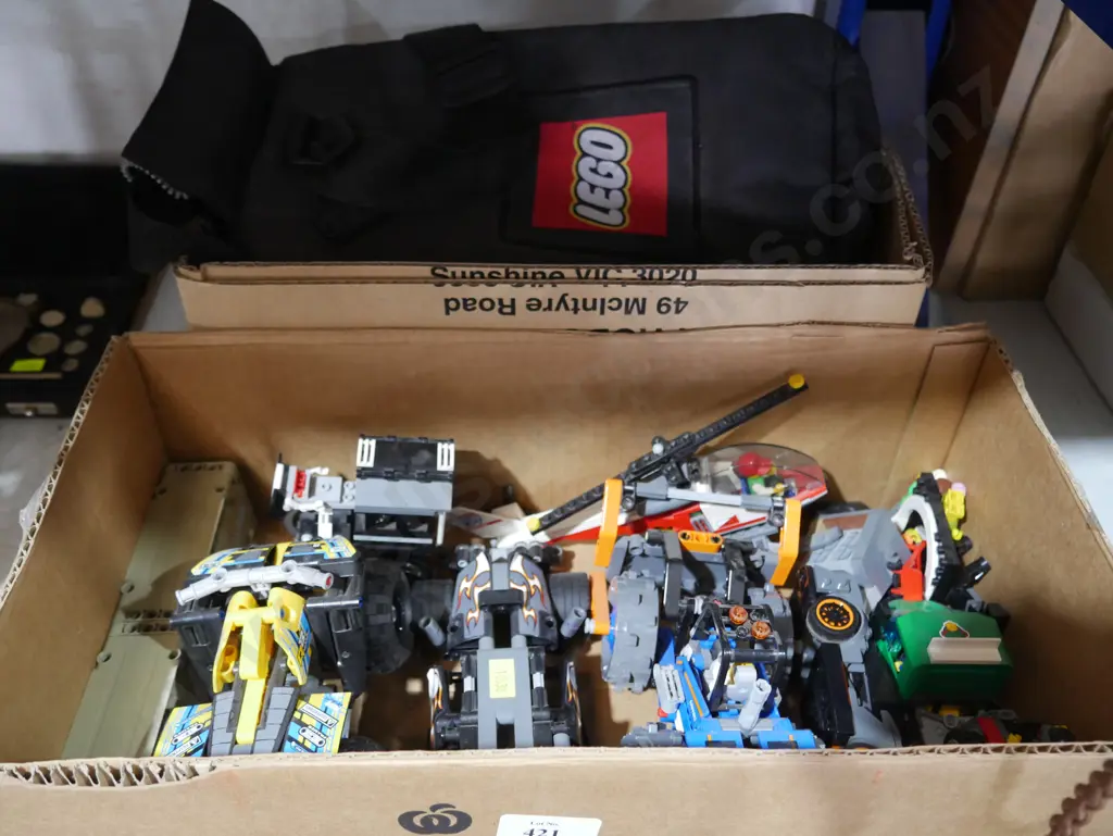 Assorted LEGO vehicles and bag Image 1++