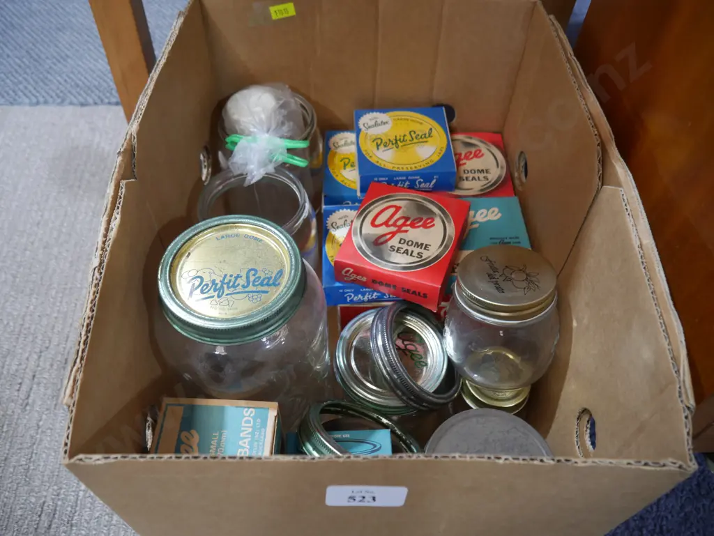 Assorted preserving jars and lids Image 1++