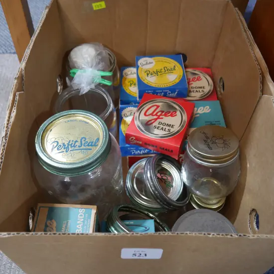 Assorted preserving jars and lids