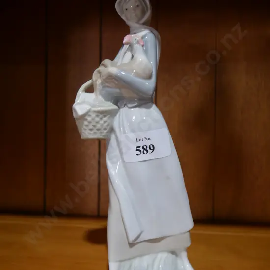 Lladro lady figurine