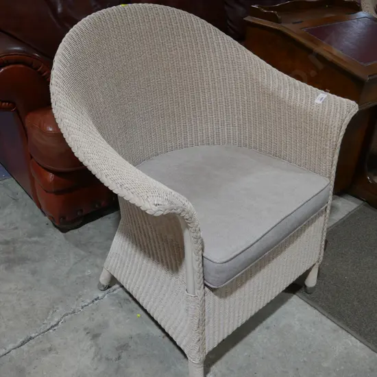 Pair of Vincent Sheppard wicker arm chairs