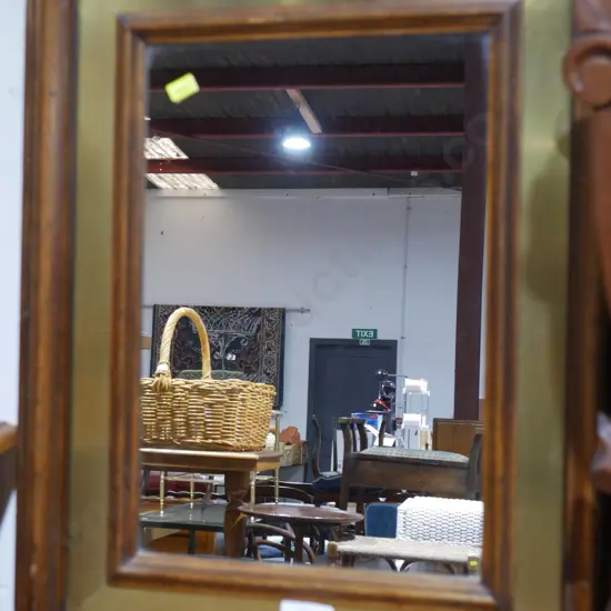 Wood and brass framed mirror