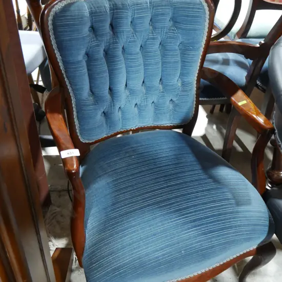 Deep buttoned occasional chair