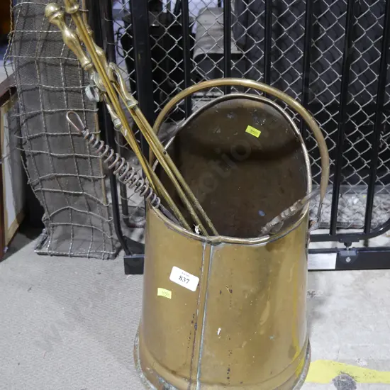Vintage brass bucket with fire tools