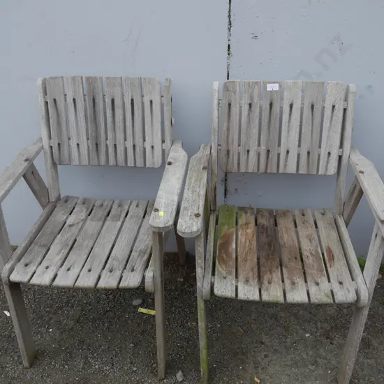 Two wooden outdoor chairs