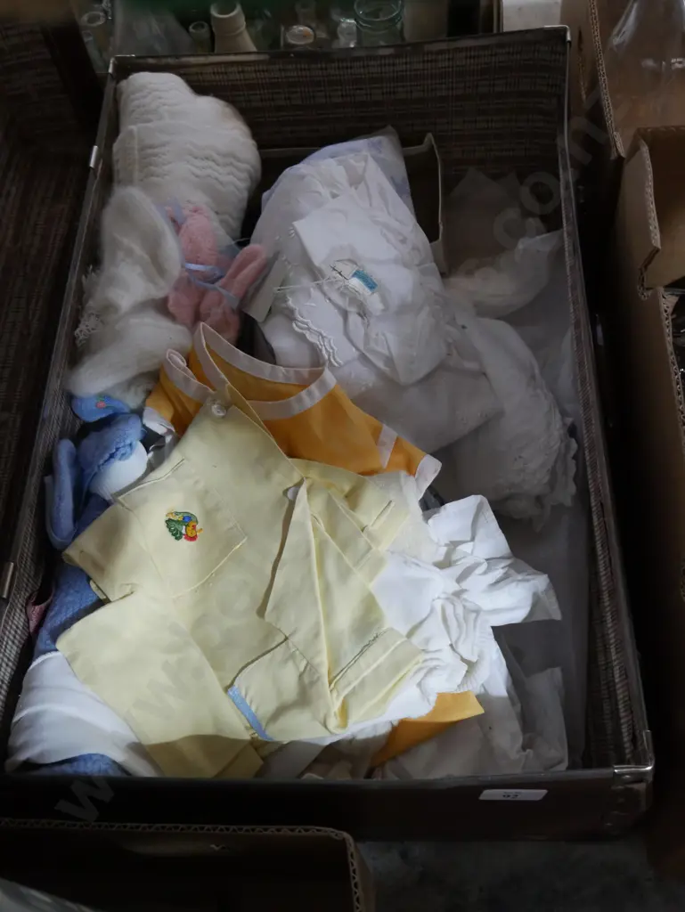 Suitcase and baby clothes Image 1++