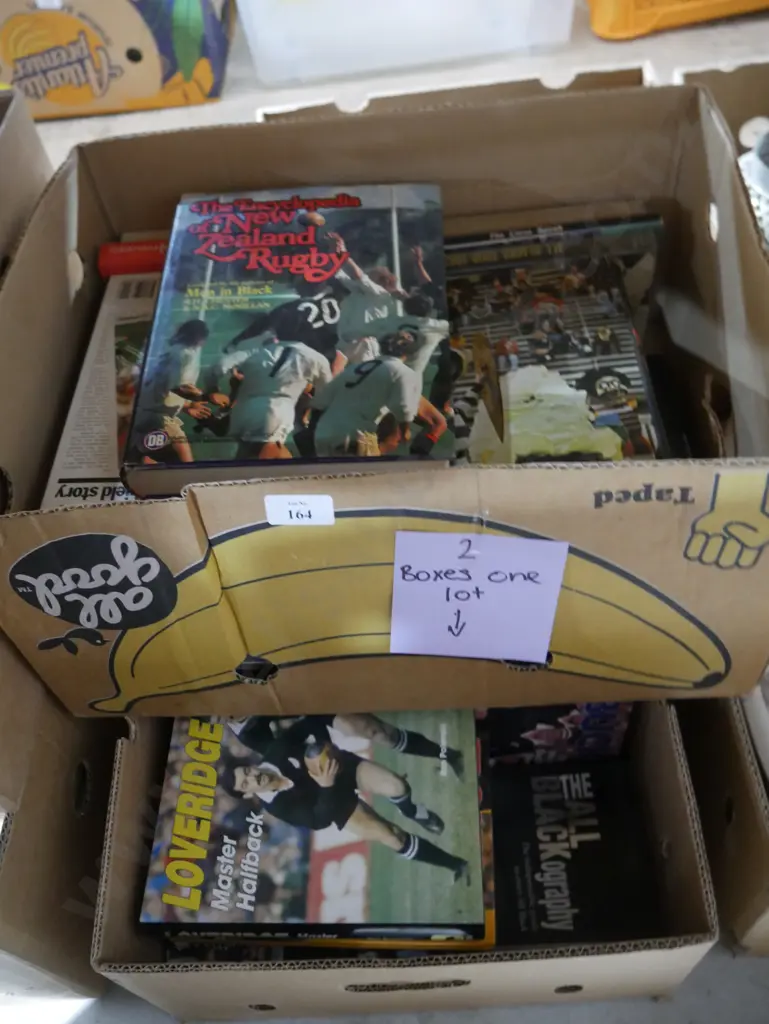 Two boxes of rugby books Image 1++