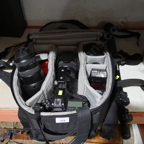 Nikon camera and accessories in bag