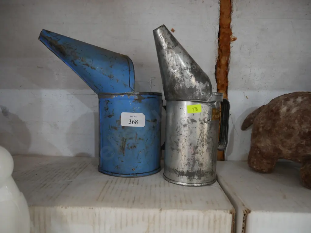 Two oil cans Image 1++