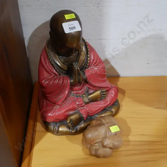 Two Buddha ornaments