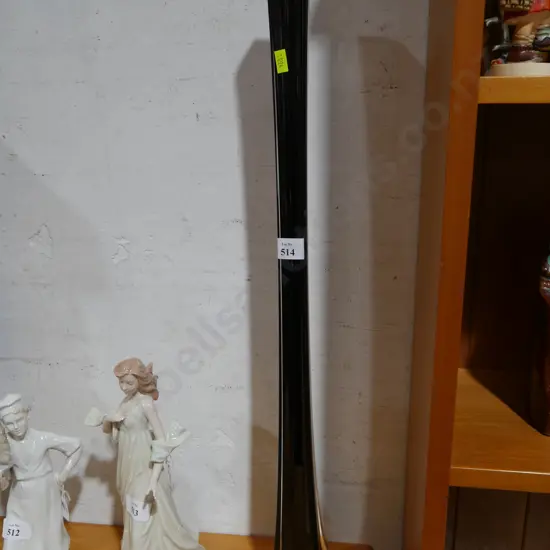 Tall black glass vase