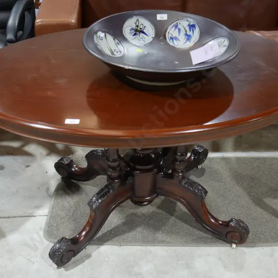 Oval top pedestal table
