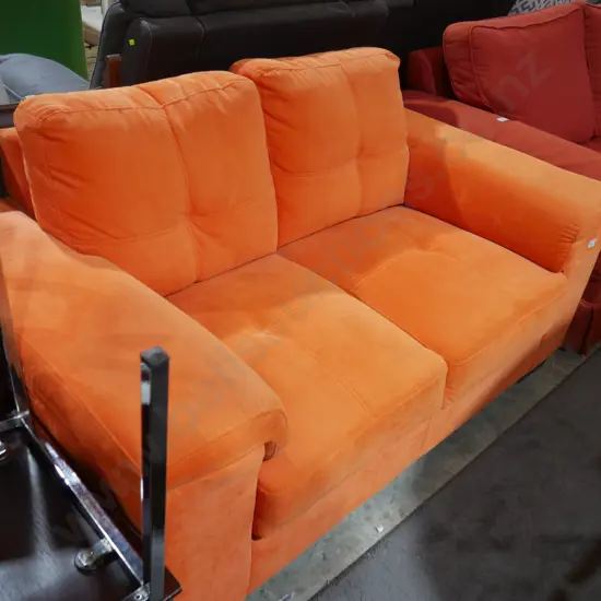 Orange two seater settee