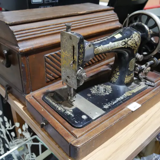 Hand crank Singer sewing machine