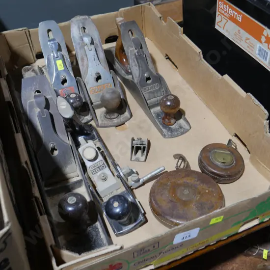 Wood planes and measuring tapes