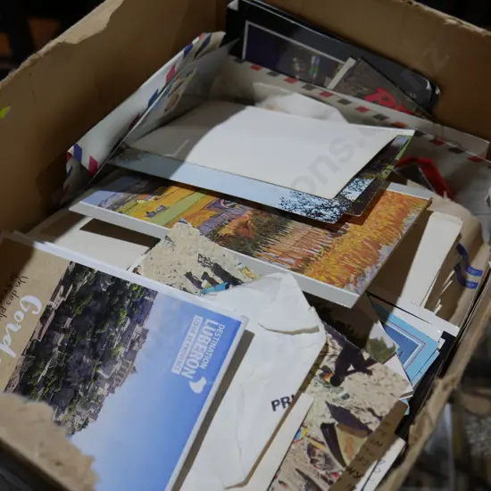 Assorted post cards and loose stamps