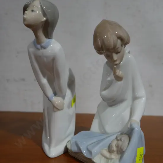 2 lladro figurines
