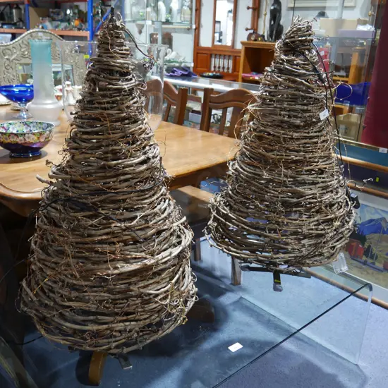 A pair of wooden decorated trees