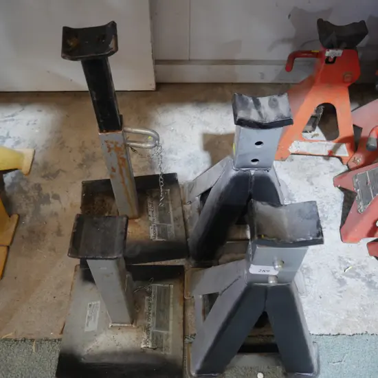 4 grey axle stands