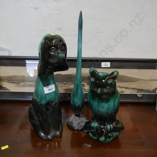 Blue mountain dog, owl, and bird.